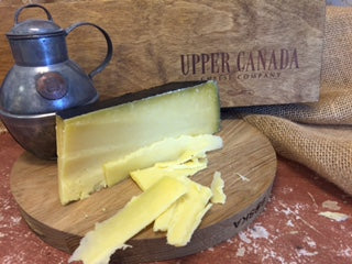 HERITAGE CHEDDAR HALF WHEEL  4.6 KG  - UPPER CANADA CHEESE CO